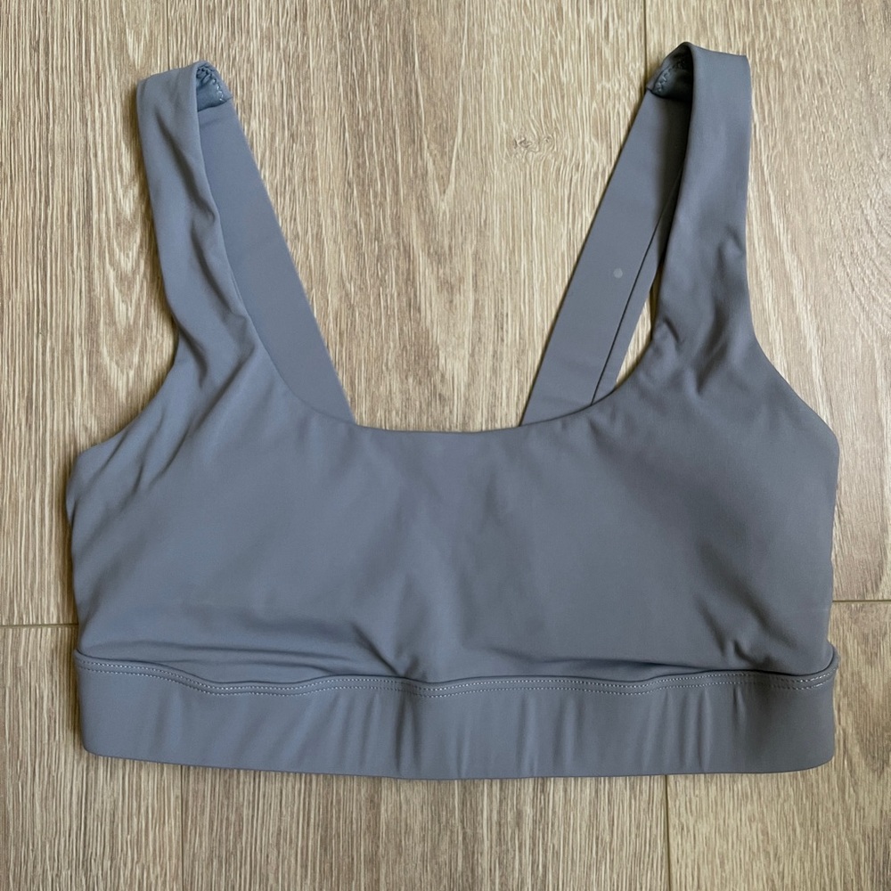 Vuori Stride Sports Bra in Flint color.